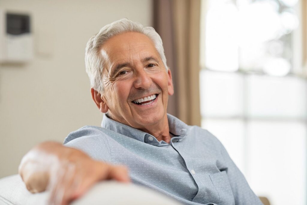 Smiling senior man with gray hair.